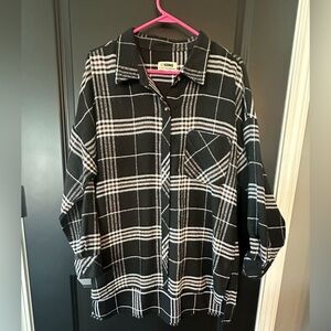 Black and White plaid flannel shirt.